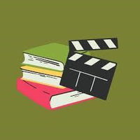 stack of books with movie clapper
