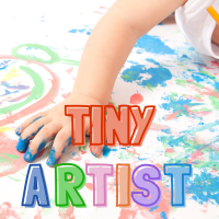 Photo of a child's hand finger painting. Text in the foreground reads tiny artists.