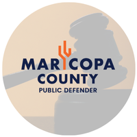 Maricopa County defender's office logo over a gavel in the background