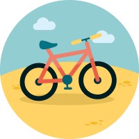 A round circle with a bicycle on a hill of land.